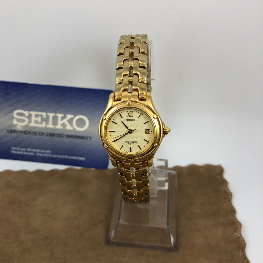 Seiko Date Gold Tone Satin Finish Bracelet Watch